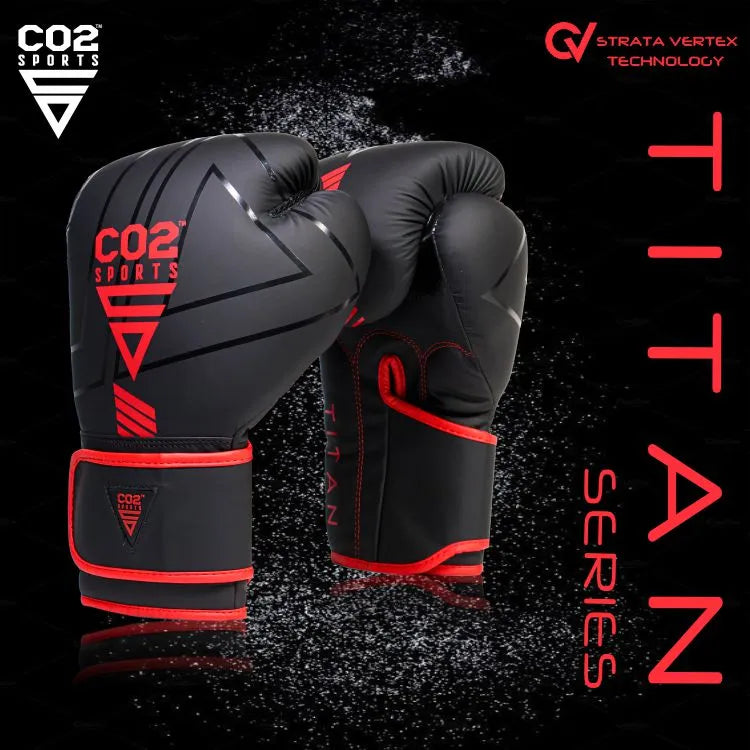 Black and red boxing gloves with CO2 Sports branding on a dark background