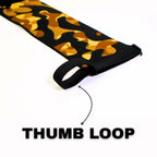 Black and gold camouflage wrist wrap with brand logo on a white background