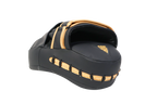 Black and gold sandal on a white background