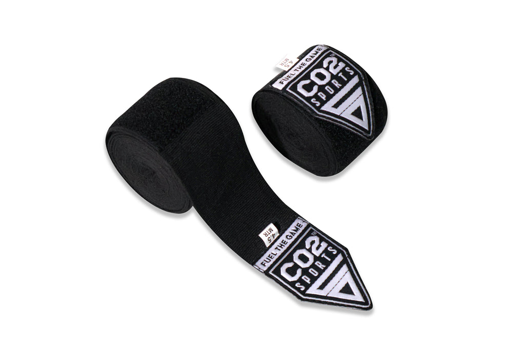 Black boxing hand wraps with CO2 Sport branding on a white background