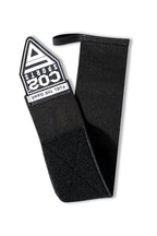 Black wrist wrap with a branded label on a white background