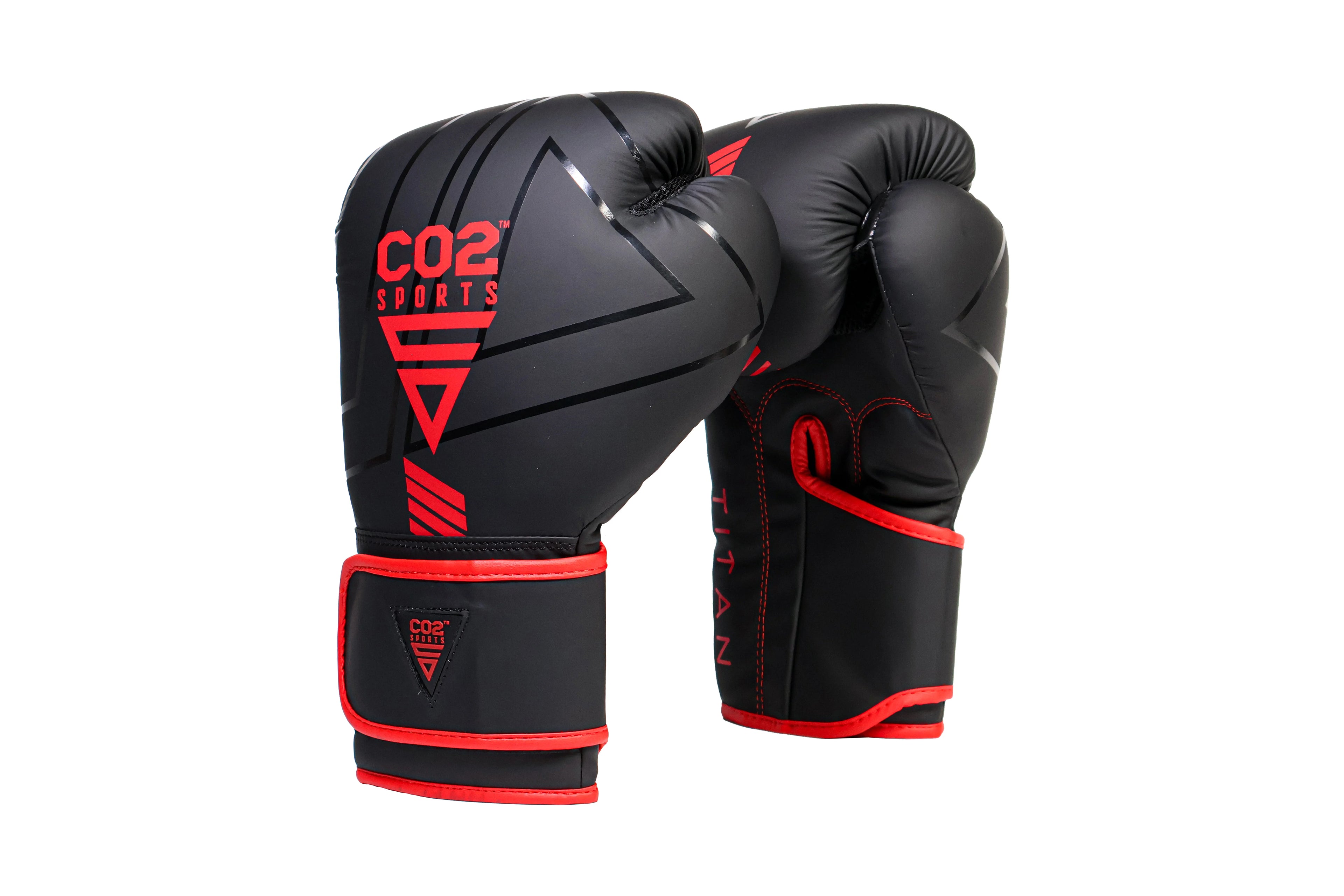 Black boxing gloves with red accents on a white background