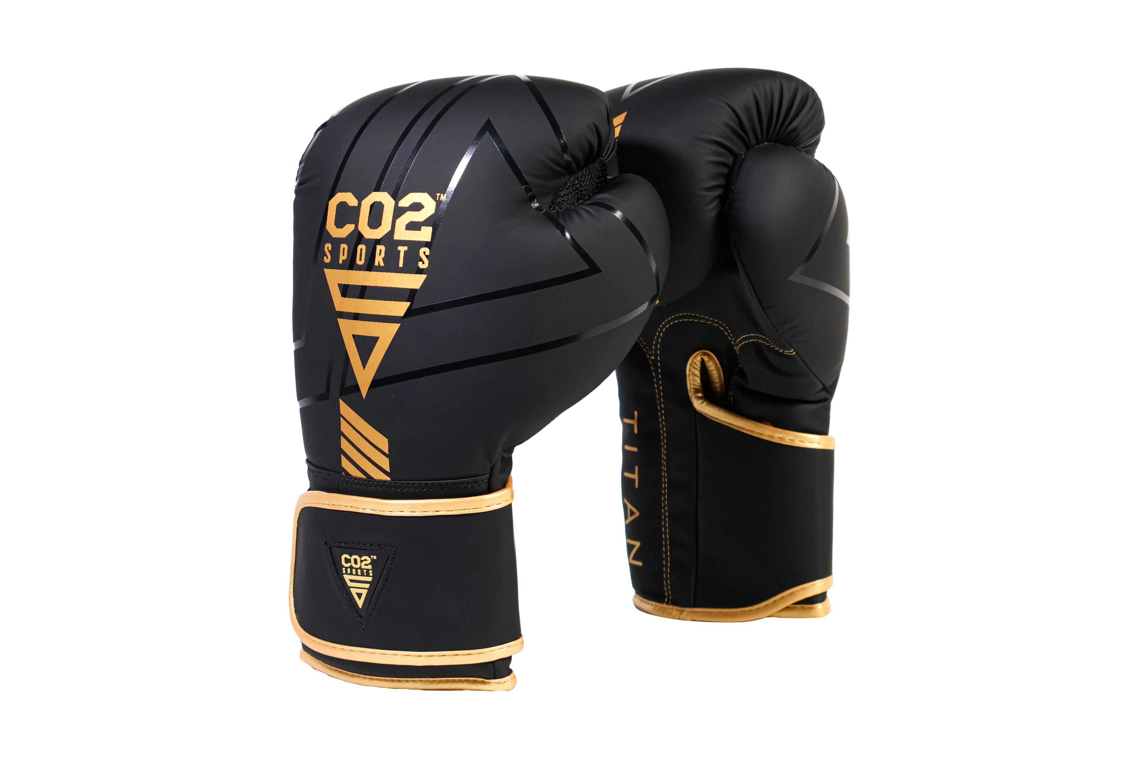 Black boxing gloves with gold accents and CO2 Sports branding on a white background