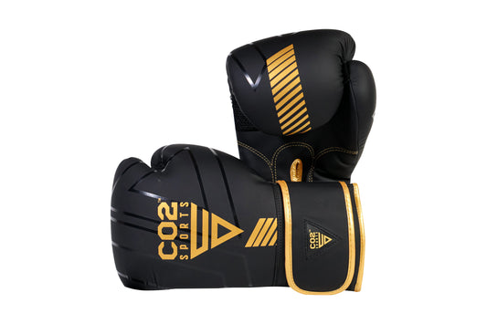 Black boxing gloves with gold accents and CO2 Sports branding on a white background