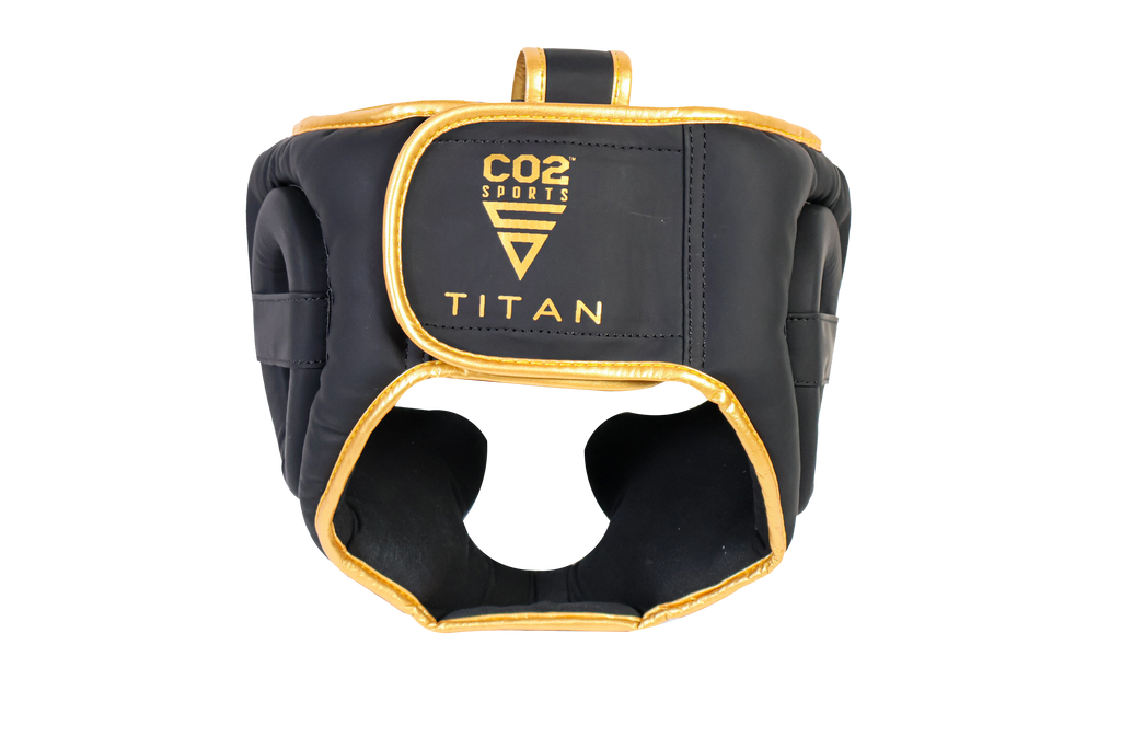 Titan head protection gear with CO2 Sports and Titan branding on a white background