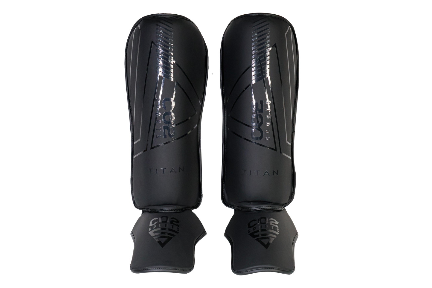Pair of black shin guards with 'Titan' branding on a white background