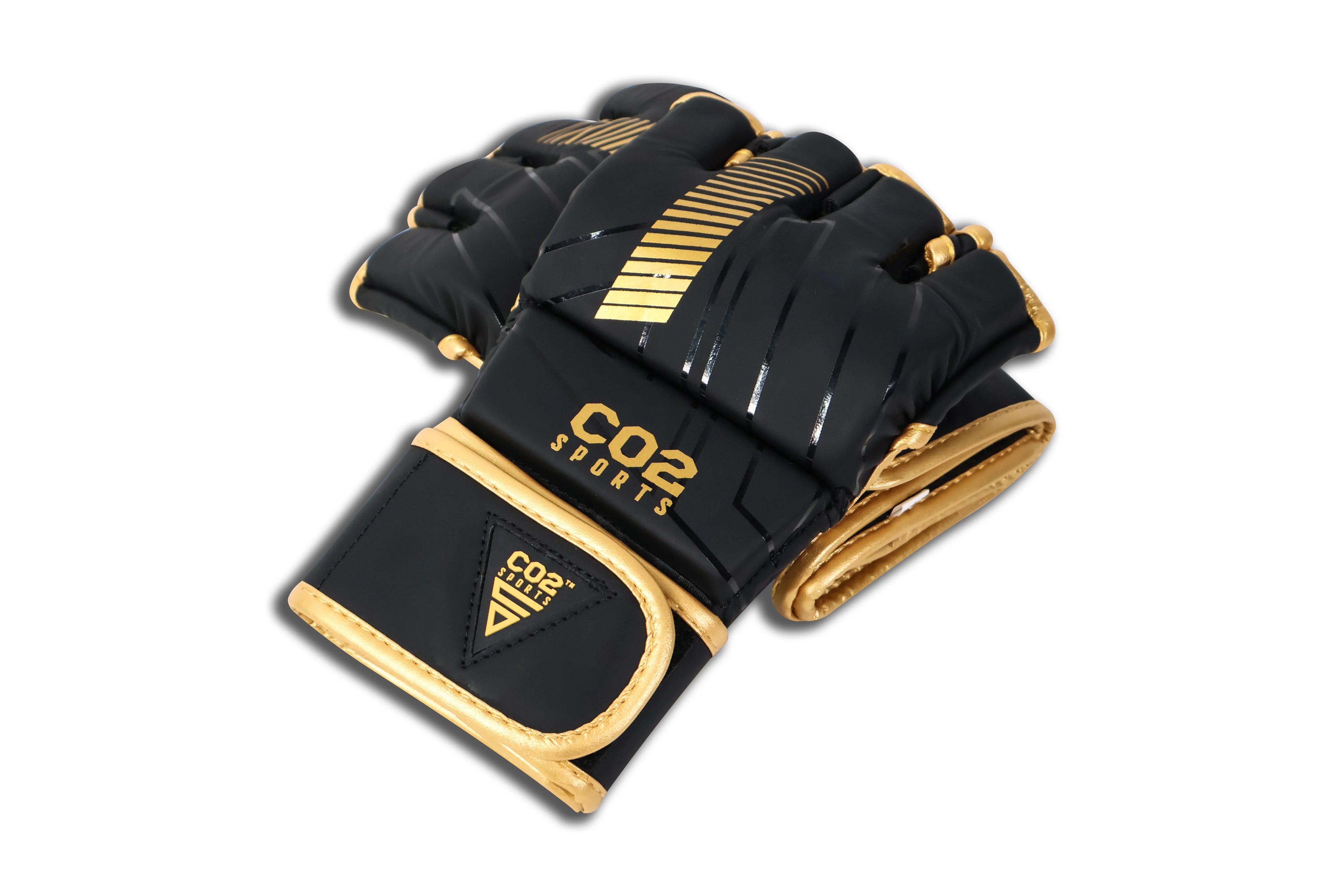 Close-up angled shot of CO2 Sports MMA gloves showing premium padding and gold detailing