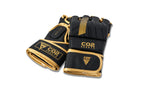 Angled flat view of CO2 Sports black and gold MMA gloves for training and sparring