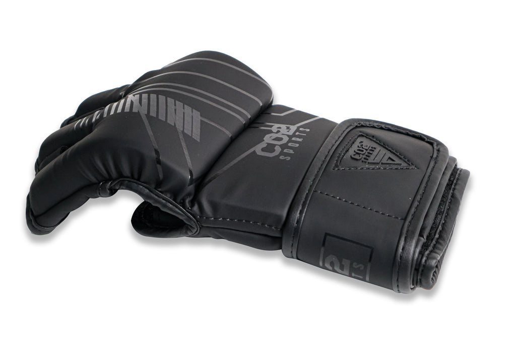 Side angle view of CO2 Sports black MMA gloves highlighting padding and stitching