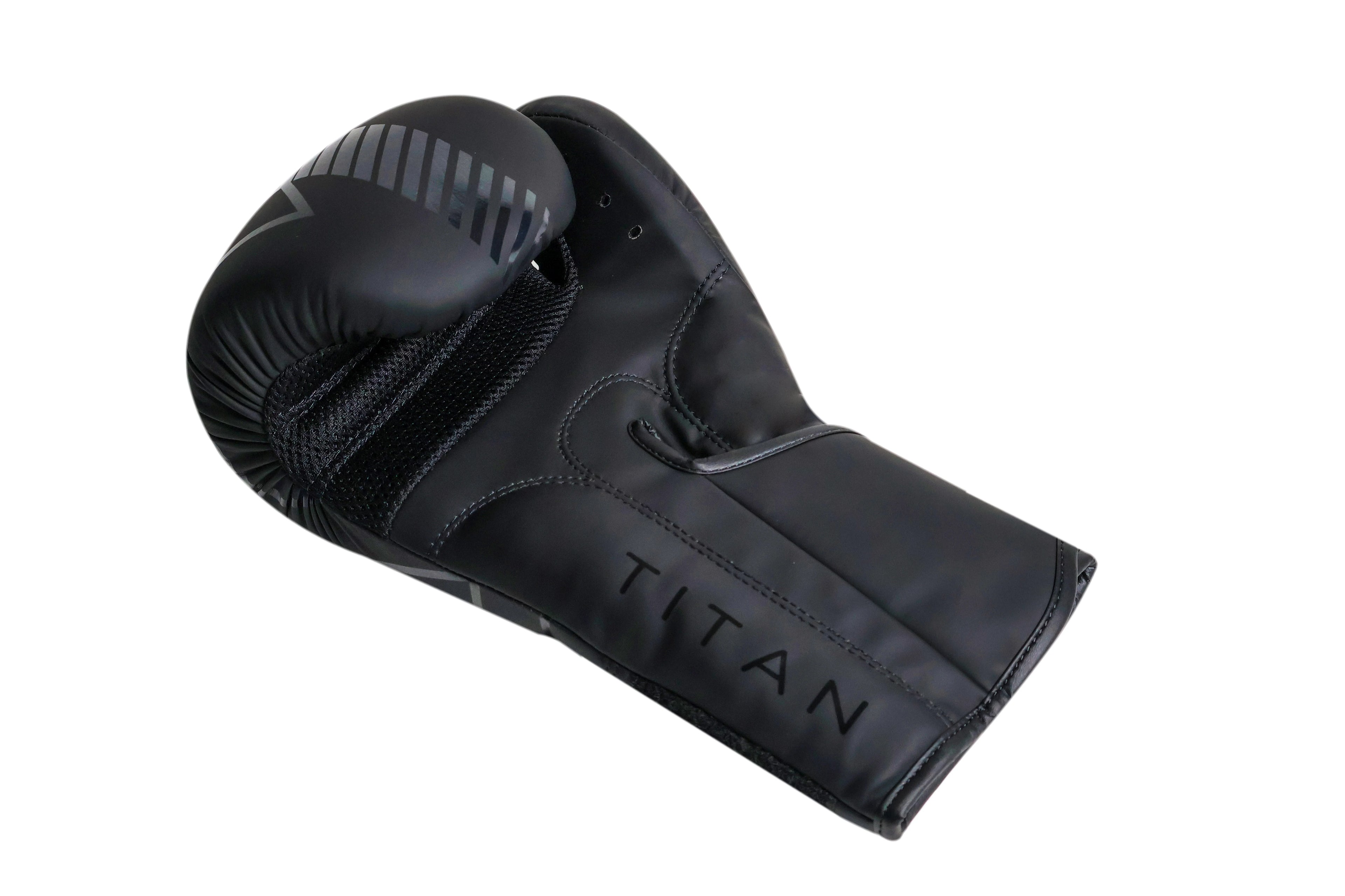 Black boxing glove with 'Titan' branding on a white background